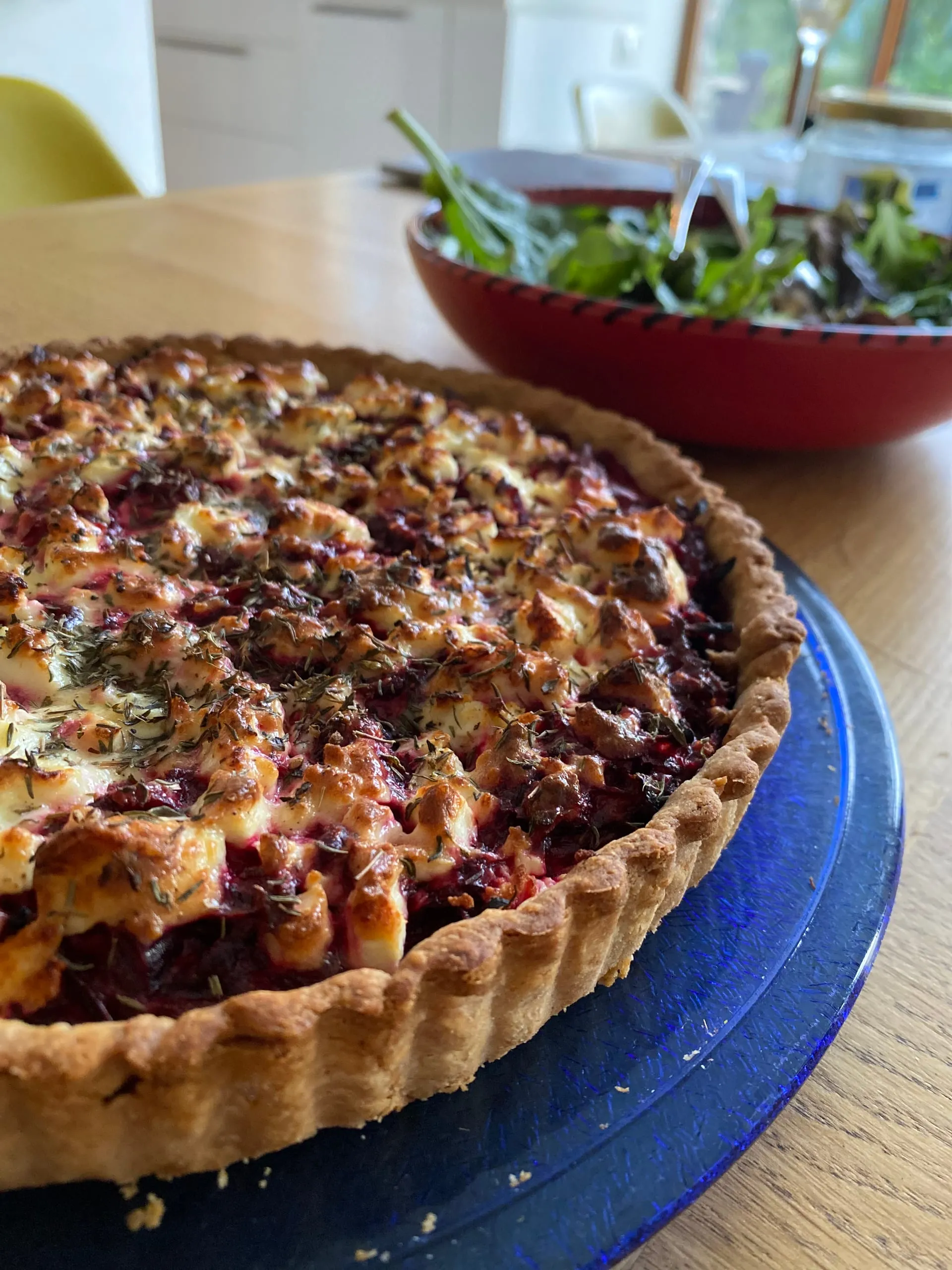 A beetroot and goat’s cheese tart scattered with thyme