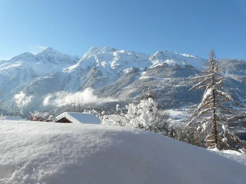 The view from the garden across the snow-covered valley